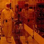 A manufacturing technician worked in the clean room at the Intel factory in Hudson in 2004.